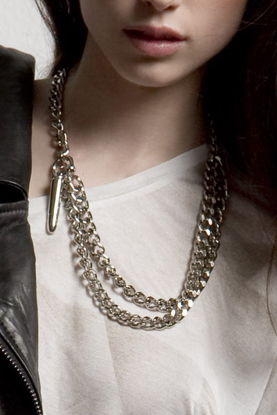NORDENFELDT Bullet Necklace long metal necklace with bullet charm in golden, worn by Tarja Turunen