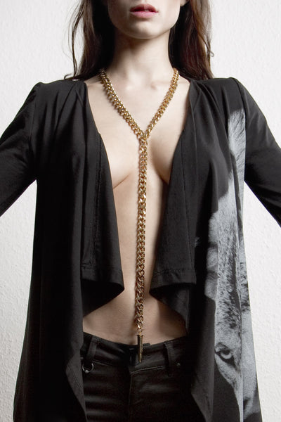 NORDENFELDT Bullet Necklace long metal necklace with bullet charm in golden, worn by Tarja Turunen